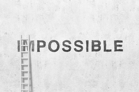 Concrete wall with ladder and word possible on backgroundの写真素材