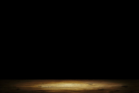 Wooden floor over dark black backgroundの写真素材