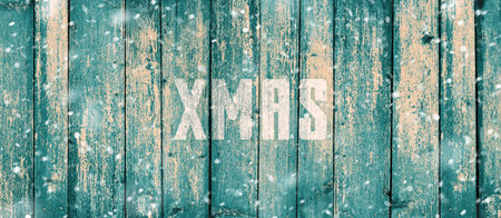 Grunge blue wood texture with word xmas on a backgroundの写真素材