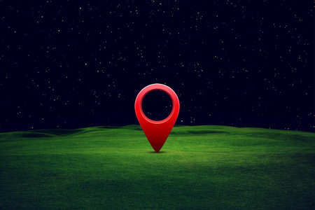 Green field under blue sky with pin location. Abstract concept imageの写真素材