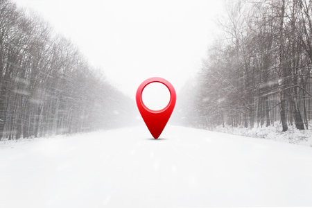 Road in winter snow covered forest with 3d red location pinの写真素材