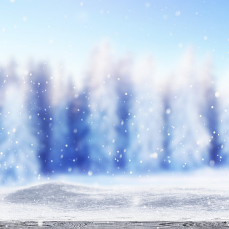 Winter snow covered forest behind wooden tableの写真素材