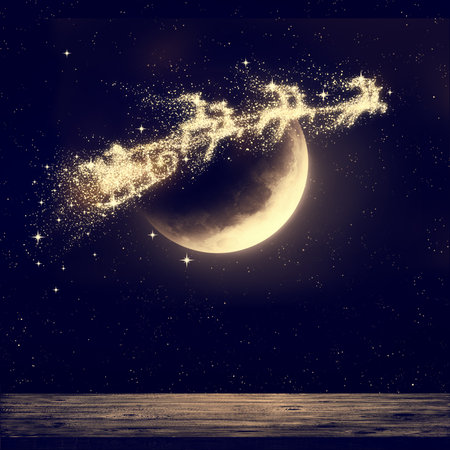 Santa flying on night sky over moon light. Merry Christmas and happy holiday.の写真素材