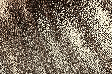 Golden metal abstract waves backgroundの写真素材