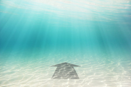 Sea bottom with grey arrow. Abstract conceptual imageの写真素材