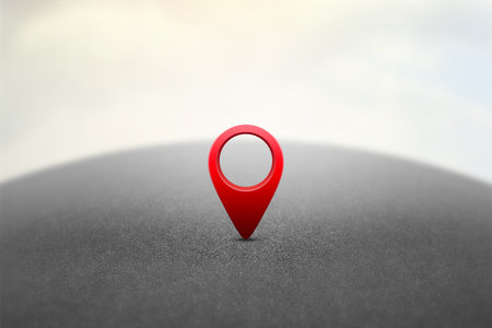 Red GPS pin on asphalt highway backgroundの写真素材