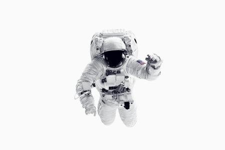 Astronaut in space suit over white background.の写真素材