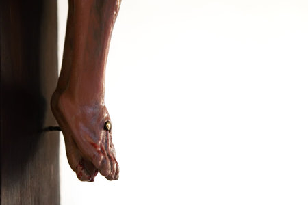 Detail of jesus feet - wooden crossの写真素材