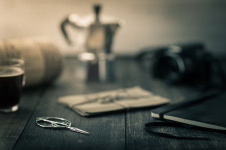 Table with hobby items such as a camera, agenda and the likeの写真素材