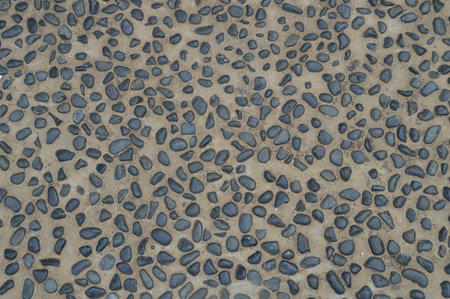 Cobble Stones In Cement Background