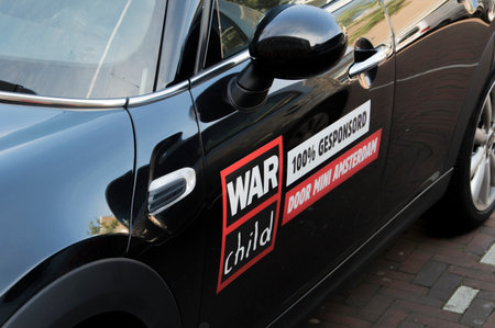 Advertisement Of War Child On A Car At Amsterdam The Netherlands 2018のeditorial素材