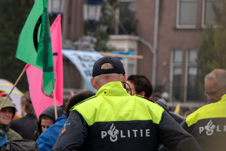Police And Protesters At The Blauwebrug At The Climate Demonstration From The Extinction Rebellion...
