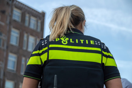 Police Woman With A P99 Gun At Amsterdam The Netherlands 2019のeditorial素材