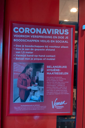 Vomar Supermarket Warns About The Coronavirus At Amsterdam The Netherlands 2020のeditorial素材
