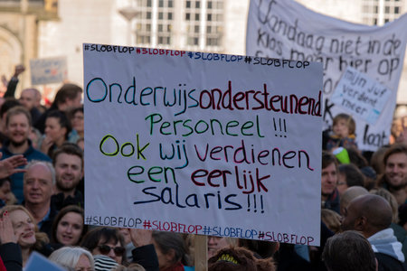 Close Up Billboard At The Education Demonstration On The Dam Square Amsterdam The Netherlands 2019のeditorial素材