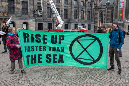 Holding A Banner At The Rebellion Extinction Group At The Demonstration On The Dam At 6-1-2020 Amsterdam The Netherlands 2020のeditorial素材