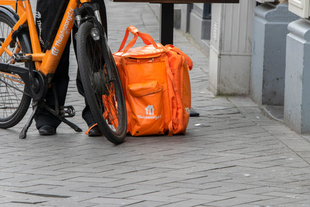 Thuisbezorgd.nl Bicycle Delivery At Amsterdam The Netherlands 2020のeditorial素材
