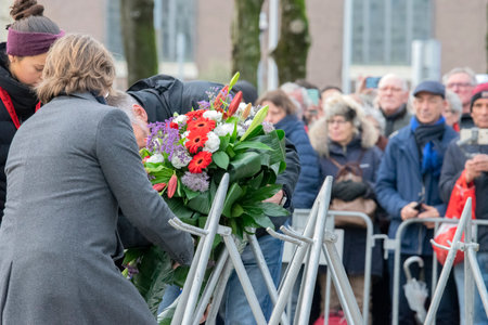 Placing Flowers At The February Strike Memorial At Amsterdam The Netherlands 2020のeditorial素材
