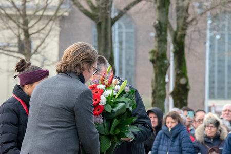 Placing Flowers At The February Strike Memorial At Amsterdam The Netherlands 2020のeditorial素材