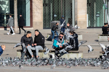 People Stay To Close At The Dam Square During The Coronavirus Outbreak At Amsterdam The Netherlands 2020のeditorial素材