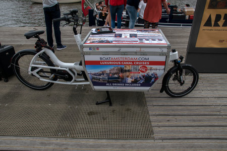 BoatAmsterdam.com Advertising Bicycle At The Amstelriver At Amsterdam The Netherlands 2019のeditorial素材