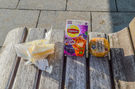Eating Breakfast On A Bench At Hiroshima Japan 2015のeditorial素材