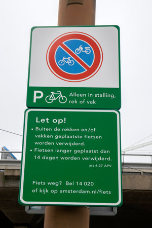 Bicycle And Scooter Parking Sign At Station Zuid At Amsterdam The Netherlands 2020のeditorial素材