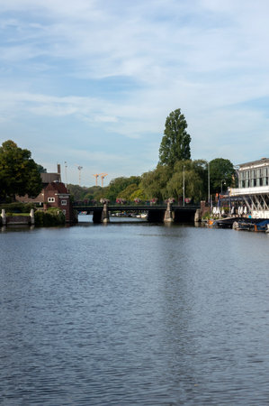 Muzenbrug Bridge And The Apollo Hotel At Amsterdam The Netherlands 2019のeditorial素材