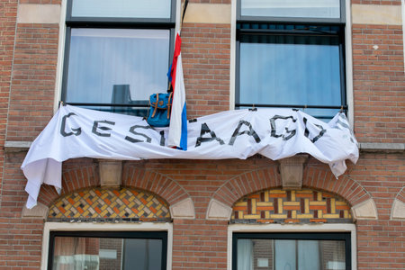 Flag And Bag And Banner A Dutch Passing Exams Tradition At Amsterdam The Netherlands 12-6-2020のeditorial素材