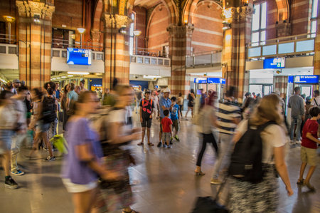 Travelers Moving Inside The Central Station At Amsterdam The Netherlands 2018のeditorial素材