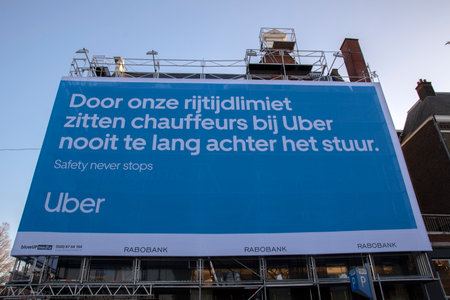 Billboard Uber Safety Never Stops At Amsterdam The Netherlands 4-12-2019 Dutch Versionのeditorial素材
