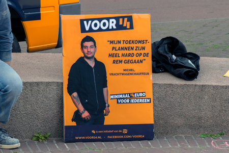 Poster At The Demonstration For A 14 Euro Wages At Amsterdam The Netherlands 7/1/2020のeditorial素材