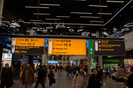 Direction Signs Behind The Gates Of Schiphol At Amsterdam The Netherlands 12-12-2019のeditorial素材