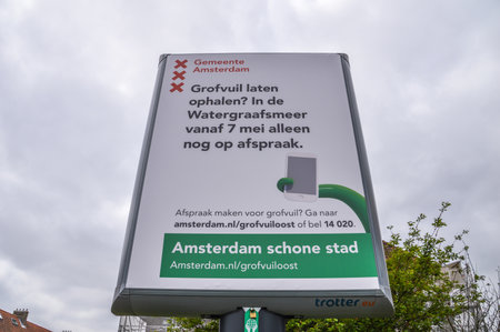 Billboard Of The City Of Amsterdam East At The Netherlands 2018 New Way Of Garbage Collectionのeditorial素材