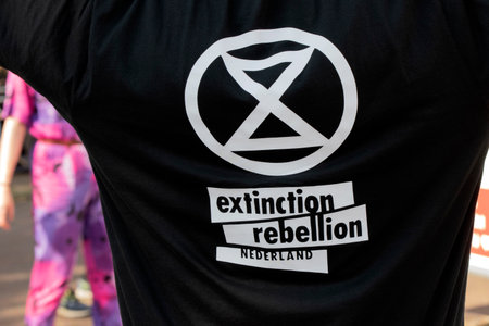 Logo On Demonstrator During The Rebellion Extinction Demonstration At The Blauwebrug Bridge At Amsterdam The Netherlands 20-7-2020のeditorial素材