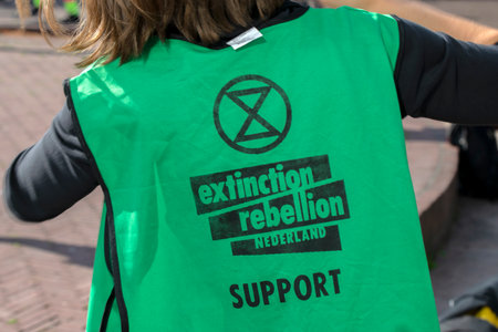 Logo On Demonstrator During The Rebellion Extinction Demonstration At The Blauwebrug Bridge At Amsterdam The Netherlands 20-7-2020のeditorial素材