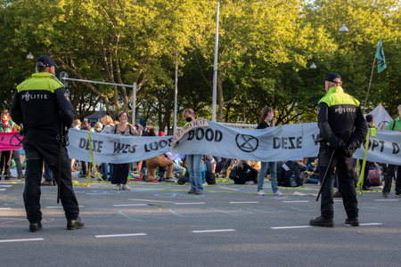 Police Men Guarding The Demonstrators The Rebellion Extinction Demonstration At Amsterdam South The...
