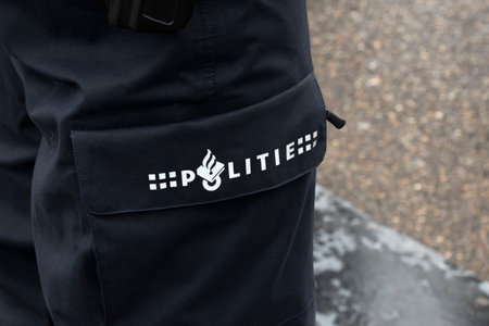 Police Logo On The Pants Of A Police Man At Amsterdam The Netherlands 12-10-2020