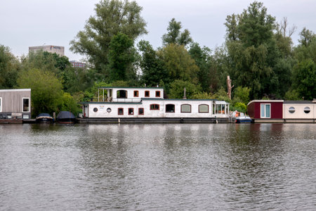 Houseboat Along The River Amstel At Amsterdam The Netherlands 6-10-2020のeditorial素材