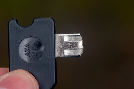Close Up AXA Broken Bicycle Key At Amsterdam The Netherlands 28-3-2021のeditorial素材