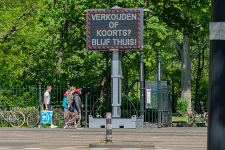 Warning Billboard Corona At The Oosterpark Park At Amsterdam the Netherlands 9-5-2020のeditorial素材