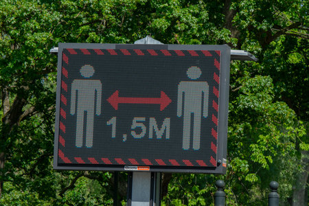 Warning Billboard Corona At The Oosterpark Park At Amsterdam the Netherlands 9-5-2020のeditorial素材