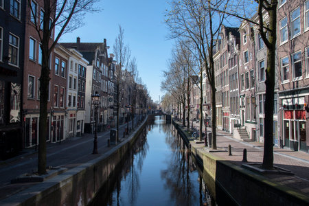 Empty Oudezijds Voorburgwal Canal At Amsterdam The Netherlands 3/25/2020