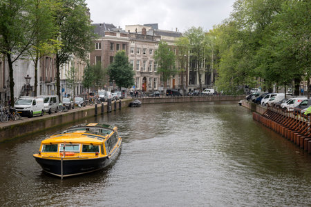 Canal Cruise Boat At The Herengracht Canal The Netherlands 18-8-2021のeditorial素材
