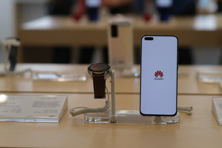 Shanghai,China-Sep.2020: close up HUAWEI smart phone and watch product in retail store.のeditorial素材