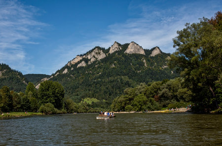 Rafting on Dunajec Border River in Pieniny in Poland and Slovakia with view at Trzy Korony Mountainのeditorial素材