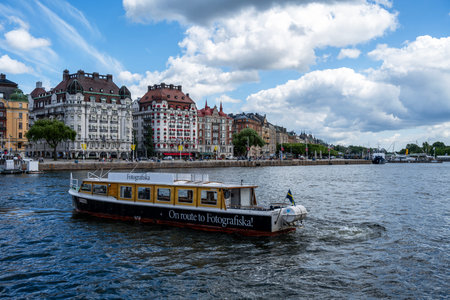 Stockholm, Sweden - July 4th 2023 - a Boat in the City Centreのeditorial素材