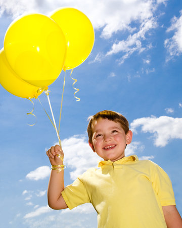 Happy child with balloonsの写真素材