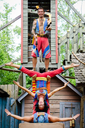 ATLANTA - MAY 20: Performers doing a stunt at the annual Renaissance Festival in Atlanta on May 20, 2012. The festival is a popular annual tourist attraction in the Southeast.のeditorial素材