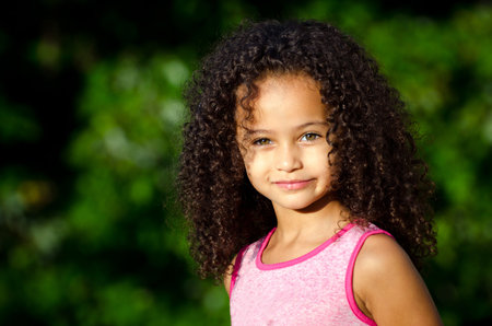 Outdoor portrait of pretty mixed race African-American girlの写真素材